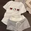 Bộ đồ ngủ chấm bi hoạt hình Nhật Bản dành cho nữ mùa hè mềm mại Thân thiện với da Áo chui đầu dễ thương Tay ngắn Slim-F