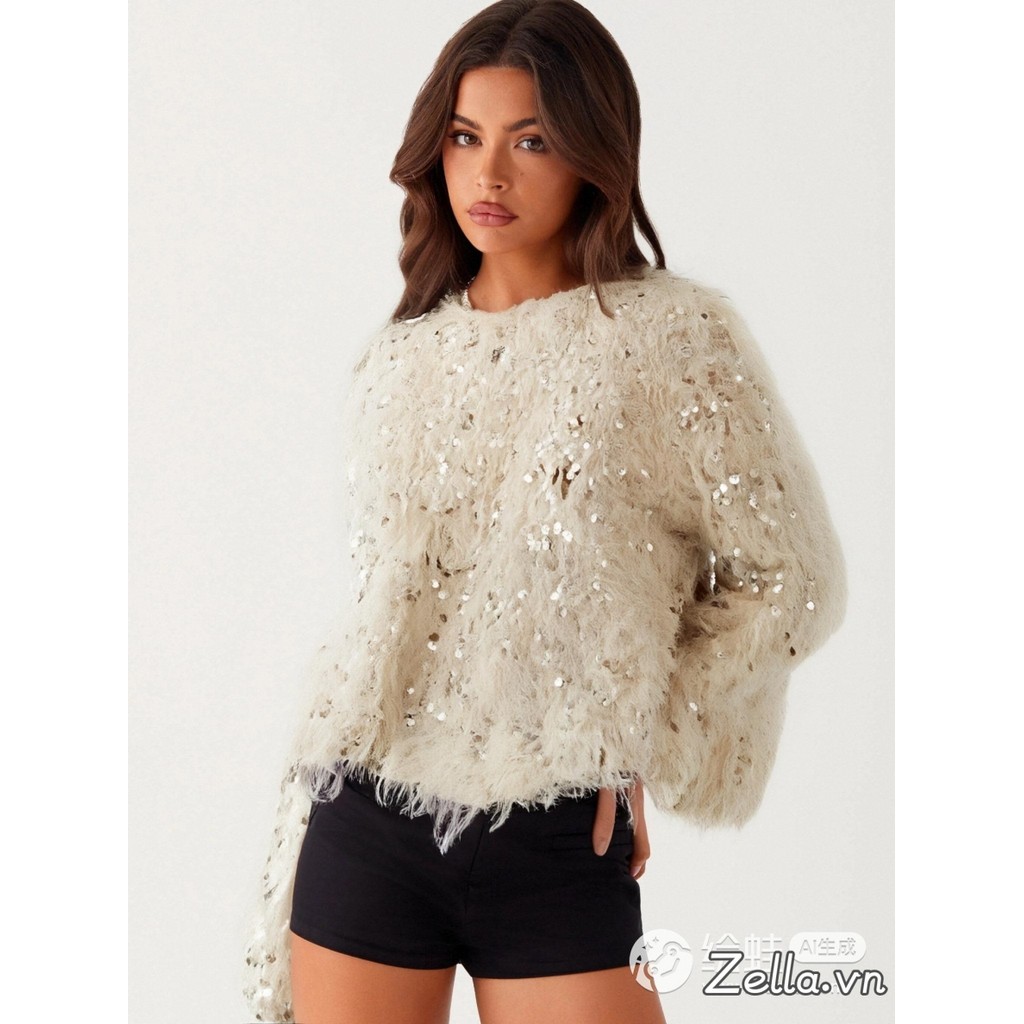 Áo len nữ sequin cổ tròn dài tay với chi tiết lông tua rua, phù hợp mùa đông và thu