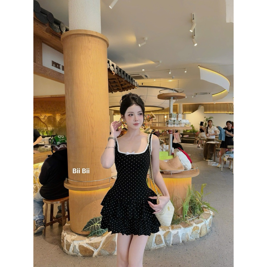 ĐẦM THUN BI 2 DÂY VIỀN ĐÍNH NƠ ĐEN XOÈ TẦNG BYJOLIE