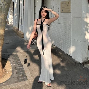 Đầm dạ hội đuôi cá màu sắc tương phản bodycon cho nàng diện đi biển