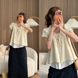 Áo babydoll mùa hè 2 lớp đũi hàn cổ V tay ngắn thắt nơ phối ren xinh xắn dành cho nữ 2026