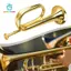 Trumpet, Nhạc cụ chuyên nghiệp được làm bằng hợp kim đồng thau để sử dụng trong dàn nhạc