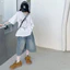Áo thun nữ màu trắng mùa hè phiên bản Hàn Quốc dành cho trẻ em In hình hoạt hình Loose Top
