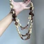 Phong Cách Bohemian Nhiều Lớp Vỏ Dừa Mặt Hàng Phong Cách Retro Phong Cách Tòa Án Thời Trang Áo Len Phù Hợp Với Tất Cả Các Trận Đấu 2025 Hợp Thời Trang