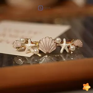 Kẹp tóc nữ sao biển có trang trí ngọc trai Kẹp bên gió đại dương cho các bữa tiệc phù dâu mới