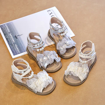 2026 Thanh Lịch Bé Gái Đấu Sĩ Sandal Gothic Ren Nơ Trẻ Em Xăng đan Cao Cấp Rỗng Trẻ Em Nhân Quả Đi Biển Sandal La Mã