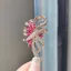 Xingdai Thổ Cẩm Nữ Tính Khí Tinh Tế Xòe Quần Áo Phụ Kiện Hợp Kim Kim Kim Cương Giả Pin Niche Chống chói Khóa Pin