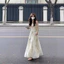 Váy treo màu trắng dành cho nữ, váy dài chữ A nghệ thuật và thanh lịch