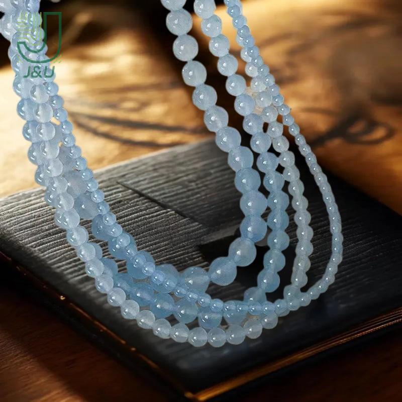 Vòng cổ choker nữ đơn giản với hạt đá tự nhiên màu hồng và xanh, phù hợp làm quà tặng hoặc trang sức hàng ngày