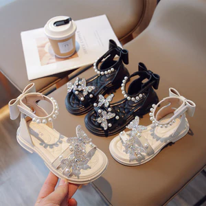 Giày Sandal Nữ La Mã 2026 Phong Cách Mới Mùa Hè Bé Gái Thời Trang Dễ Thương Đế Mềm Nơ Kim Cương Giả Công Chúa Giày Trẻ Em