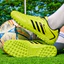Giày bóng đá chuyên nghiệp Spikes Giày tập luyện trẻ thấm hút sốc thoáng khí JQQQ