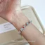 Retro Aquamarine với vòng cổ hạt tròn màu đỏ Bộ vòng tay mùa xuân hè Chuỗi xương đòn phù hợp