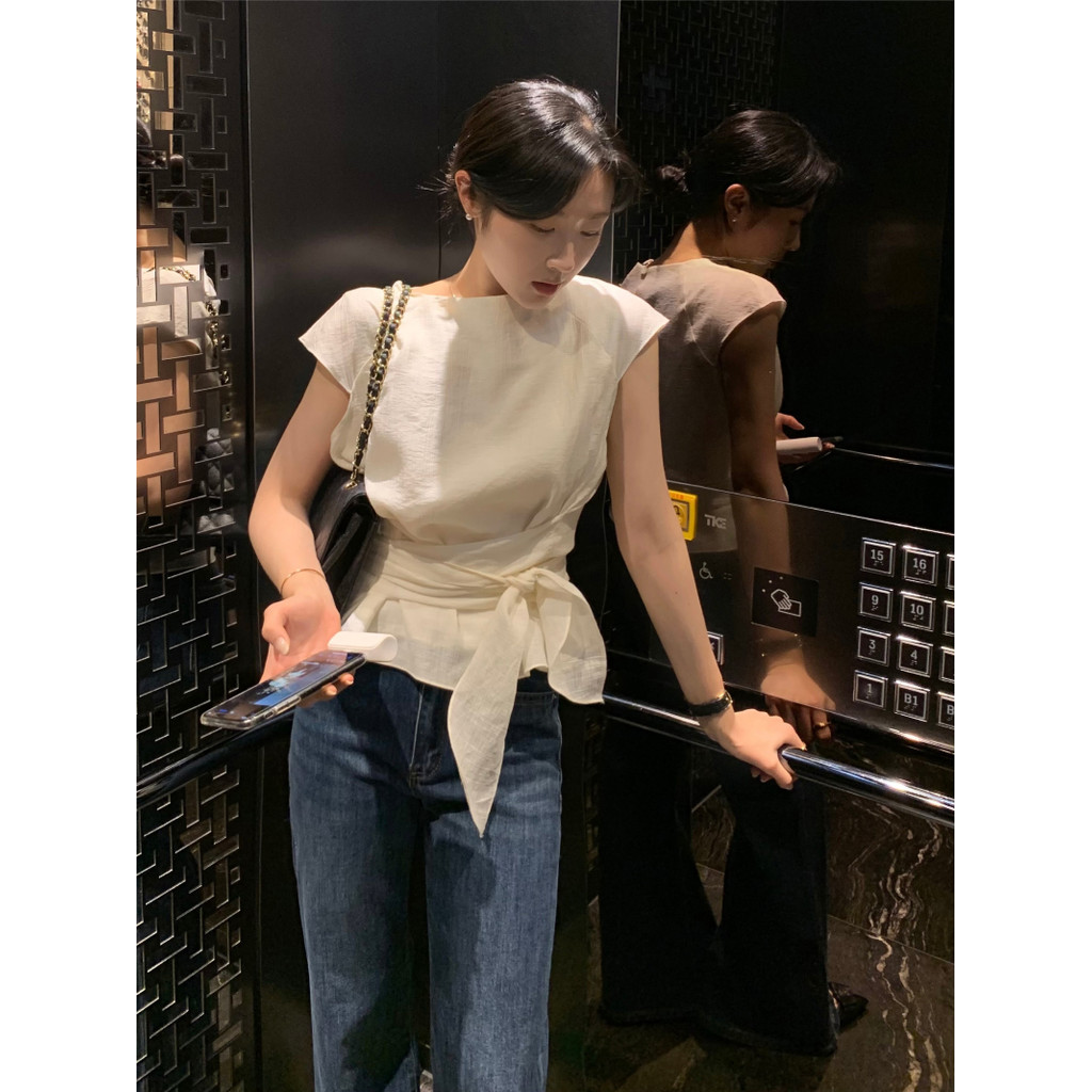 SUXI Áo sơ mi buộc dây thông thường màu trơn giản dị và nhẹ nhàng dành cho nữ mùa hè mới 260529