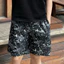 Quần short đi biển in họa tiết lá mùa hè dáng rộng thời trang nam quần short đi biển thông thường