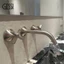 Vòi GESSI của Ý dùng cho lắp đặt chậu rửa âm tường, vòi âm tường ba lỗ GESSI màu xám gunmetal đơn giản.