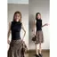 Bộ đồ nữ mùa hè 2026 Phong cách mới Pure Desire Style Slim-fit Áo Vest không tay dệt kim Top họa tiết da báo Bộ đồ hai mảnh