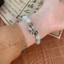 Mới Trung Quốc Opal Đính Hạt Vòng Tay Nữ Cổ Chuông Mặt Dây Chuyền Vòng Tay Niche Thiết Kế Retro Phù Hợp Với Vòng Tay Hợp Thời Trang