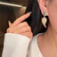 Tua Rua Phong Cách Dài Tính Khí Phong Cách Mới Zircon Nhẹ Bông Tai Sang Trọng