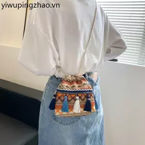 Yunnnan Phong Cách Dân Tộc Túi Messenger Nữ Retro Lệ Giangxi Phiên Bản Đôi Stab Winnan Du Lịch Thêu Tiền Xu