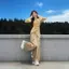 Phong cách Trung Quốc mới Không đều sang trọng Áo chéo viền loe tay áo nữ phù hợp với eo co giãn Quần ống rộng Bộ đồ hai mảnh