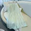 Váy xếp ly màu sâm panh Nữ Xuân Hè Phong cách mới Streamer Sợi lớn viền chữ a Váy ô mỏng hơn Váy cổ tích