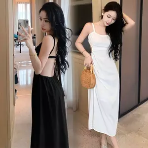 Phong cách mong muốn thuần khiết Đi biển Kỳ nghỉ Dây đeo sang trọng Đầm đi biển dài mùa hè