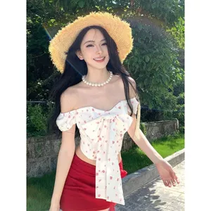 Váy đỏ kỳ nghỉ sóng nhiệt nơ Neon Bộ đồ giảm tuổi hoa nhỏ Váy ngắn mùa hè một vai cho nữ Váy ngắn hai @