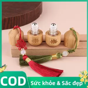 Trong Kho 1Ml Tre Con Lăn Chai Phong Cách Cổ xưa Nước Hoa Tinh Dầu Container Với Mặt Dây Chuyền Cá Tuyết