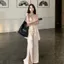 Thiết Kế Sense Không Đều Cổ Chữ v Treo Top Nữ Chia Quần Dài Eo Cao Ôm Hơn Nhìn Thường Ngày Thời Trang Hai Mảnh