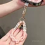 Mini Ring Phong Cách Điện Thoại Di Động Dây ins Nữ Niche Cao Cấp Nguyên Bản Làm Tay Sản Phẩm Mới Thời Trang Hương Thơm Nhỏ Ngoài Trời