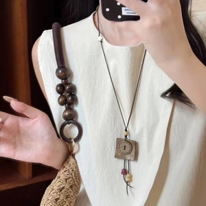 Mới Phong Cách Trung Quốc Mặt Trăng Ngôi Sao Vòng Cổ Nữ Retro Vỏ Dừa Cao Cấp Tua Rua Áo Len Dây Chuyền Hoa Rỗng Vòng Cổ Mặt Dây Chuyền