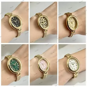 Đồng hồ đeo tay thạch anh PYCOU, Đồng hồ dây chuyền tua rua hợp kim vàng, Phụ kiện thời trang tinh tế Đồng hồ thạch anh hình bầu dục Trang phục thời trang