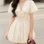 ĐẦM TRẮNG CỔ V DÁNG NHÚN PHỒNG