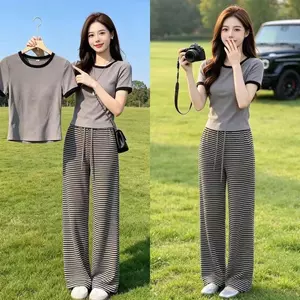 Bộ đi lại mùa hè Một bộ dành cho nữ Phong cách mới Vỏ bụng Thời trang Slimmer Look Top Quần ống rộng sọc eo cao Bộ hai mảnh