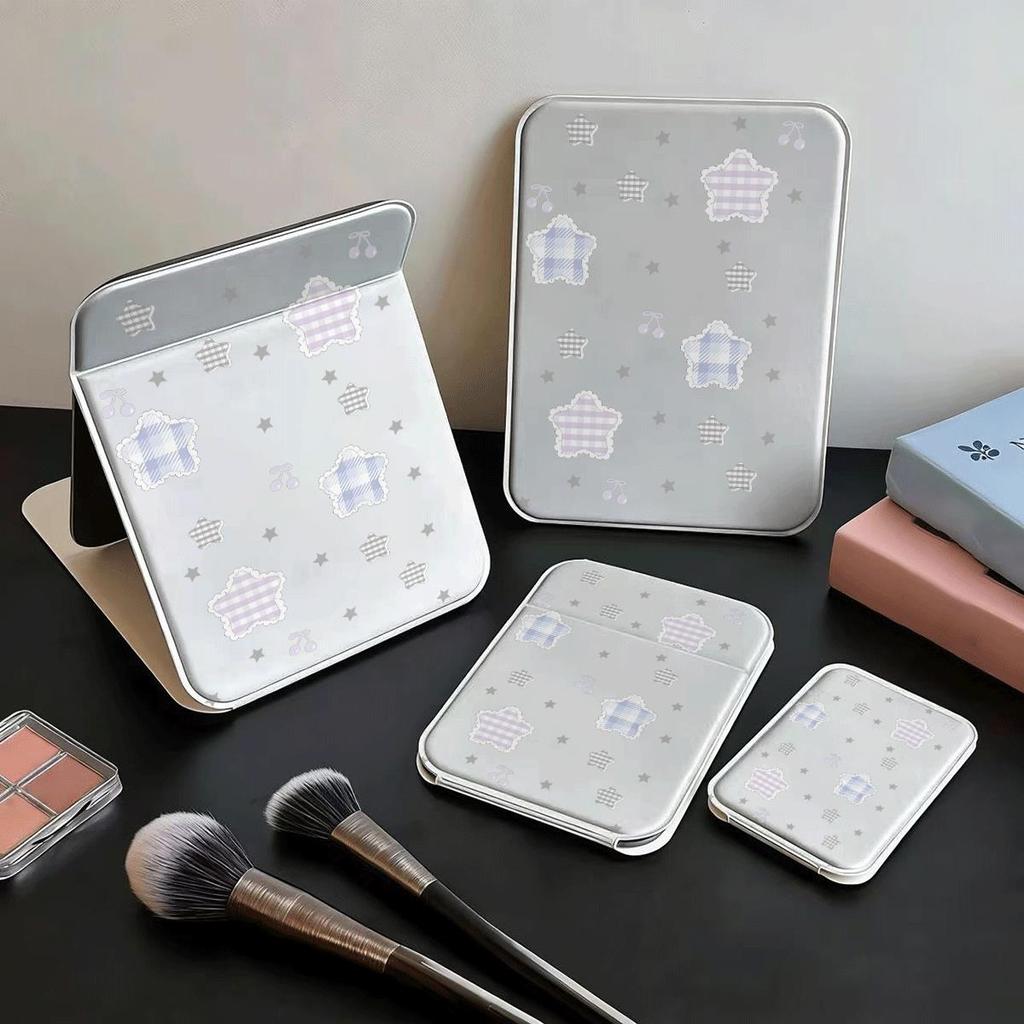 Gương gấp bỏ túi họa tiết ngôi sao nơ tím nền trắng phong cách nhẹ nhàng
