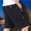 Quần short chở hàng màu trơn nhẹ mùa hè dành cho nam, Quần short thể thao dáng rộng cỡ lớn