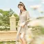 Váy dài tay có nút không đều Milada Nữ Thu Đông Phong cách mới Đầm công chúa sóng lưng cao kiểu Pháp cổ điển