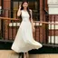 Đầm không tay trắng phong cách nhẹ nhàng kiểu Pháp mùa hè dáng rộng hẹp hơn trông dài phù hợp cho người đi làm