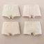 Bộ bốn đồ lót trẻ em, được làm bằng màu sắc tự nhiên, vải Cotton không nhuộm.