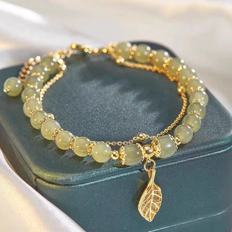 Vòng tay nữ "cành vàng và lá ngọc bích Hetian Jade 14K