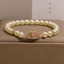 Vòng tay ngọc trai nữ - Charm vương miện thanh lịch kiểu Pháp (Zircon hình trái tim hồng) Hạt đệm pha lê Gold Accent - Trang phục hàng ngày tối giản sang trọng