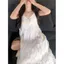 Pháp Trắng Sling Đầm Nữ Mùa Hè Phong Cách Mới Tính Khí Ren Bánh Đầm Đi Biển Kỳ Nghỉ Váy Dài