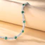 FANCIME "Noble Allure" May Birthstone Emerald Station Vòng tay bạc Sterling