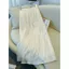 Váy xếp ly màu sâm panh Nữ Xuân Hè Phong cách mới Streamer Sợi lớn viền chữ a Váy ô mỏng hơn Váy cổ tích