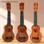 MỚI 1 Cái Học Tập Quà Tặng Giáo Dục 26 / 35cm Trẻ Em Đàn Guitar 4 Dây Nhạc Cụ Có Mái Chèo Mô Phỏng Yukrili Đồ Chơi Âm Nhạc SKY