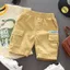 Quần short 5 điểm hàng hóa Hàn Quốc mùa hè mới dành cho bé trai Quần short dài vừa phải dành cho trẻ em, hợp thời trang