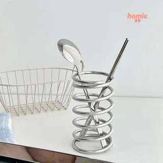 Giá đựng cọ trang điểm để bàn bằng sắt, có lỗ thoát nước, dạng khoét rỗng.