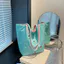 Phiên bản Hàn Quốc Thêu Puppy Canvas Tote Túi xách nữ dung tích lớn Túi xách hai mặt thông thường