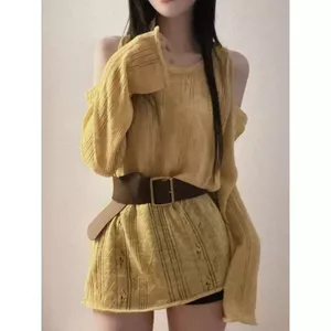 Thắt lưng Thiết kế lệch vai Đầu thu Quần dệt kim rỗng Phong cách mới Lười dáng rộng dệt kim mặt trời