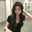 Áo thun cổ chữ V thắt nút màu đen dành cho nữ, 2026 Phong cách mới Xuân Hè Hot Girl Tay ngắn phong cách ngắn vai tích cực Slim